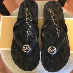 Black Michael Kors flip flops